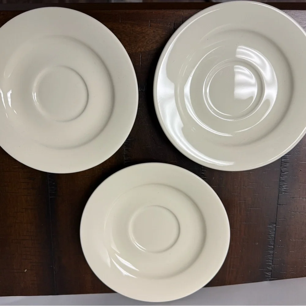 Williams Sonoma Belvedere Cream colored earthware flat cups and saucers